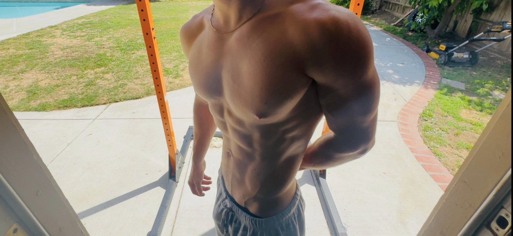 Home calisthenics training on a backyard pull-up bar rig, no gym needed